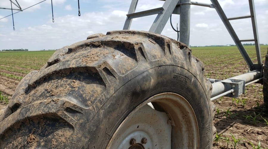 An irrigation tire that looks okay from a distance but has a subtle bulge.